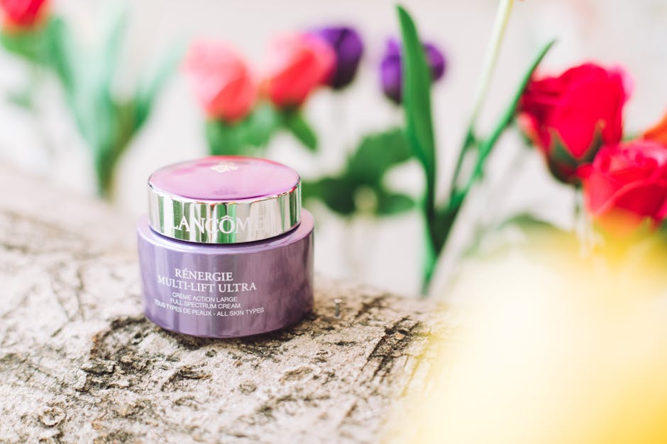 Close-up of Lancome Renergie Multi-Lift Ultra cream with a colorful floral background for a fresh, vibrant look.