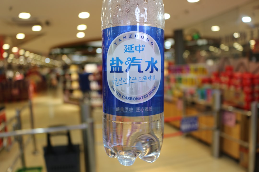 a bottle of water hanging in a store
