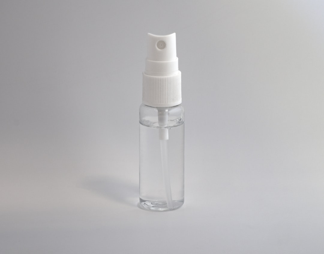 clear and white spray bottle